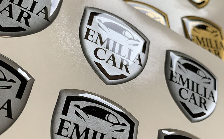 etichette resinate Etichette resinate con base argento e oro